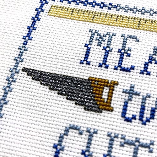 Stitched sample of Kreinik Very Fine #4 Braid on 16-count Aida