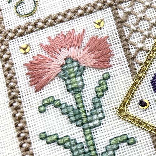 Kreinik Silk Mori in cross stitch and straight stitch on linen