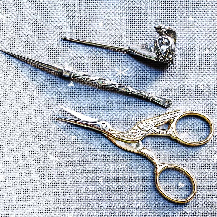 Scissors and laying tools